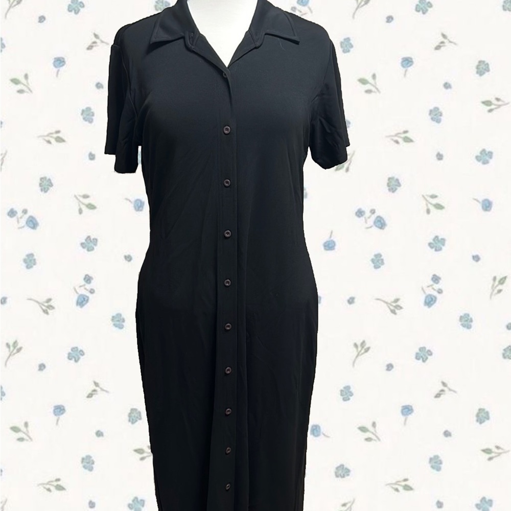 Long black button up dress.